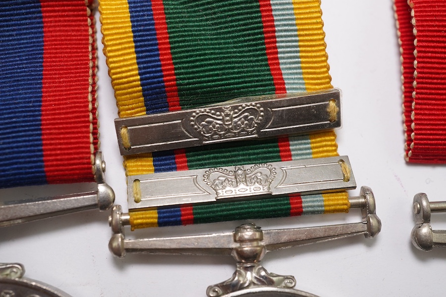 A group of assorted medals; WW2/ERII Cadet Forces medal group of 3 with two clasps to Fg.Off.W.K.Winstone R.A.F.V.R.(T); ERII RAFLSGC to Cpl B.K.Stockwell (F2570477) in box; WW2 Dm & WM. Condition - fair to good.